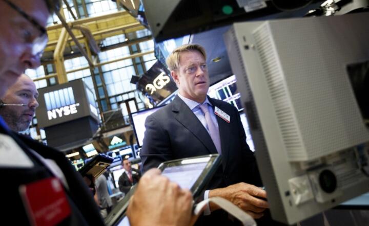 Makler na parkiecie NYSE, fot. PAP/EPA/JUSTIN LANE 