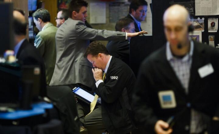 Makler na parkiecie NYSE, fot. PAP/EPA/JUSTIN LANE 