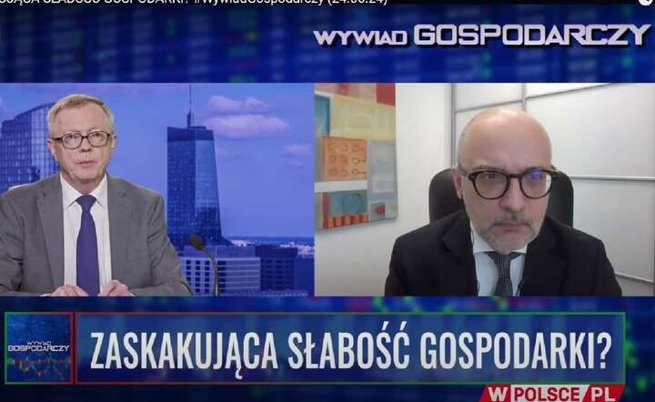Łukasz Tarnawa, główny ekonomista BOŚ (P), gość „Wywiadu Gospodarczego” -  rozmawiał red. Stanisław Koczot (L) / autor: YT wPolsce.pl / screen