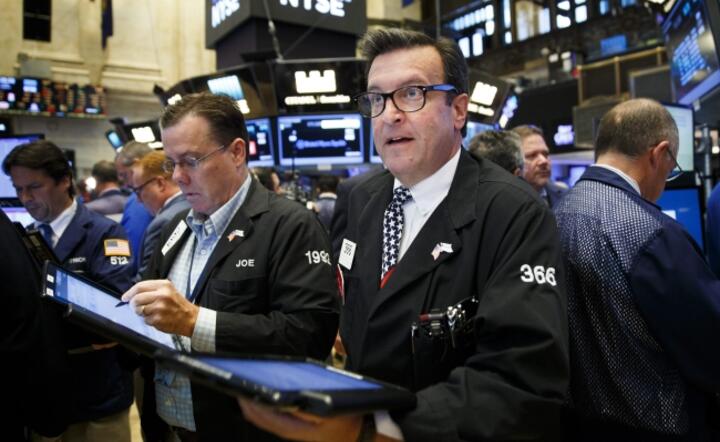 Makler na parkiecie NYSE, fot. PAP/EPA/JUSTIN LANE 