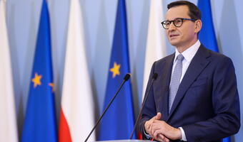 Premier: Podtrzymamy twarde weto ws. paktu migracyjnego