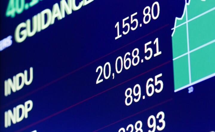 W środę indeks Dow Jones i w trakcie sesji, i na zamknięcie przekroczył psychologiczną barierę 20 tys. punktów, fot. PAP/EPA/JUSTIN LANE