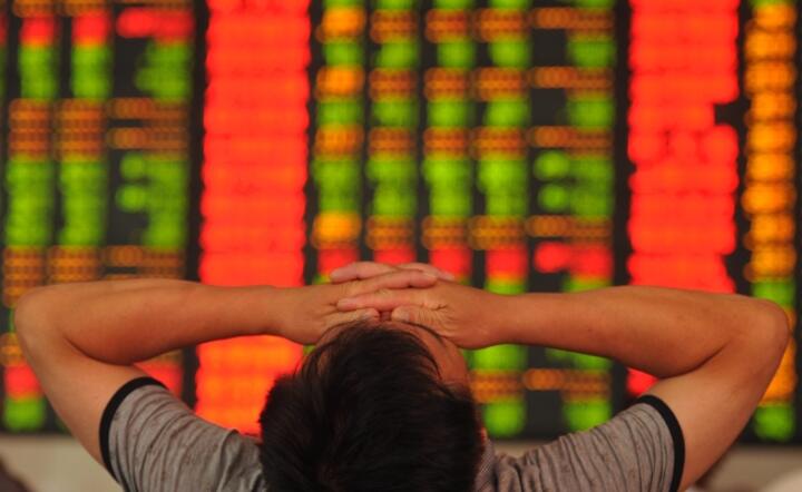 Reakcja inwestora na widok dzisiejszych notowań fot. PAP EPA/AN MING CHINA OUT