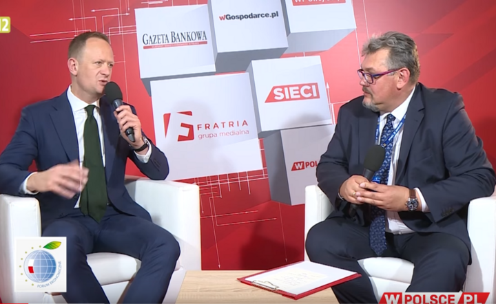 Olgierd Cieślik, prezes Totalizatora Sportowego (L) w rozmowie z red. Maciejem Wośko  / autor: Fratria