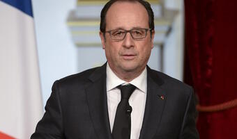 Hollande broni Merkel przed krytyką w sprawie imigrantów