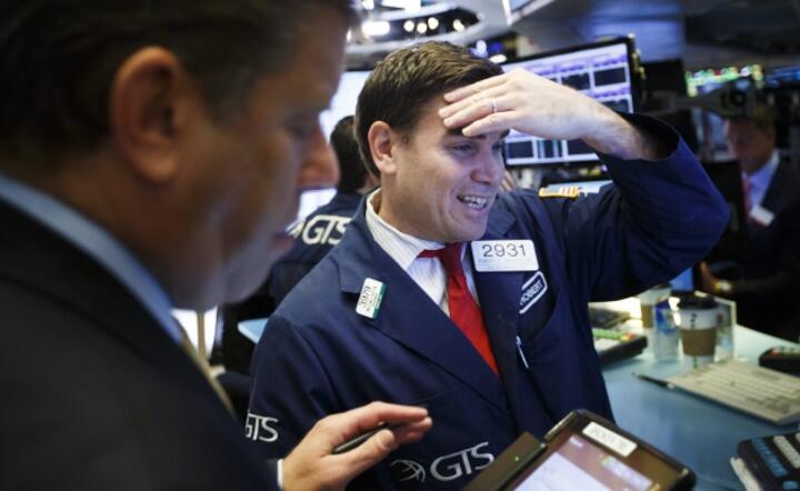 Makler na parkiecie NYSE, fot. PAP/EPA/JUSTIN LANE 