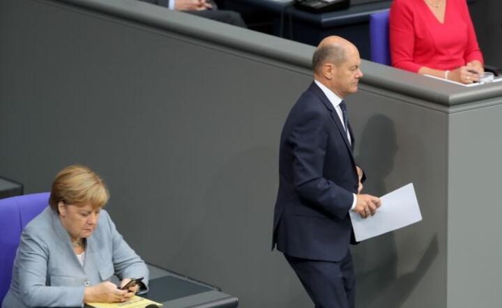Angela Merkel i Olaf Scholz  / autor: PAP/EPA/HAYOUNG JEON