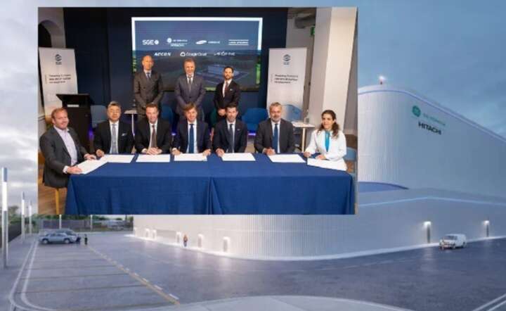 Podpisanie porozumienia inwestorów z SGE Nuclear w sprawie budowy SMR. Michał Sołowow (C - w górnym rzędzie). W tle wizualizacja SMR / autor: materiały prasowe SGE_Nuclear