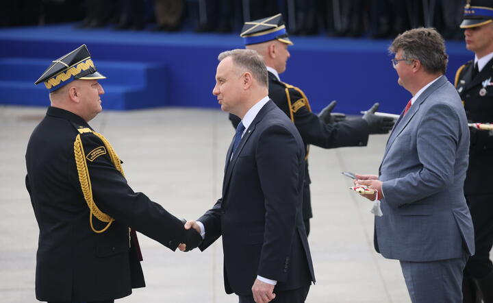 Powitanie Andrzeja Dudy i wiceministra Maciej Wąsika / autor: PAP/EPA
